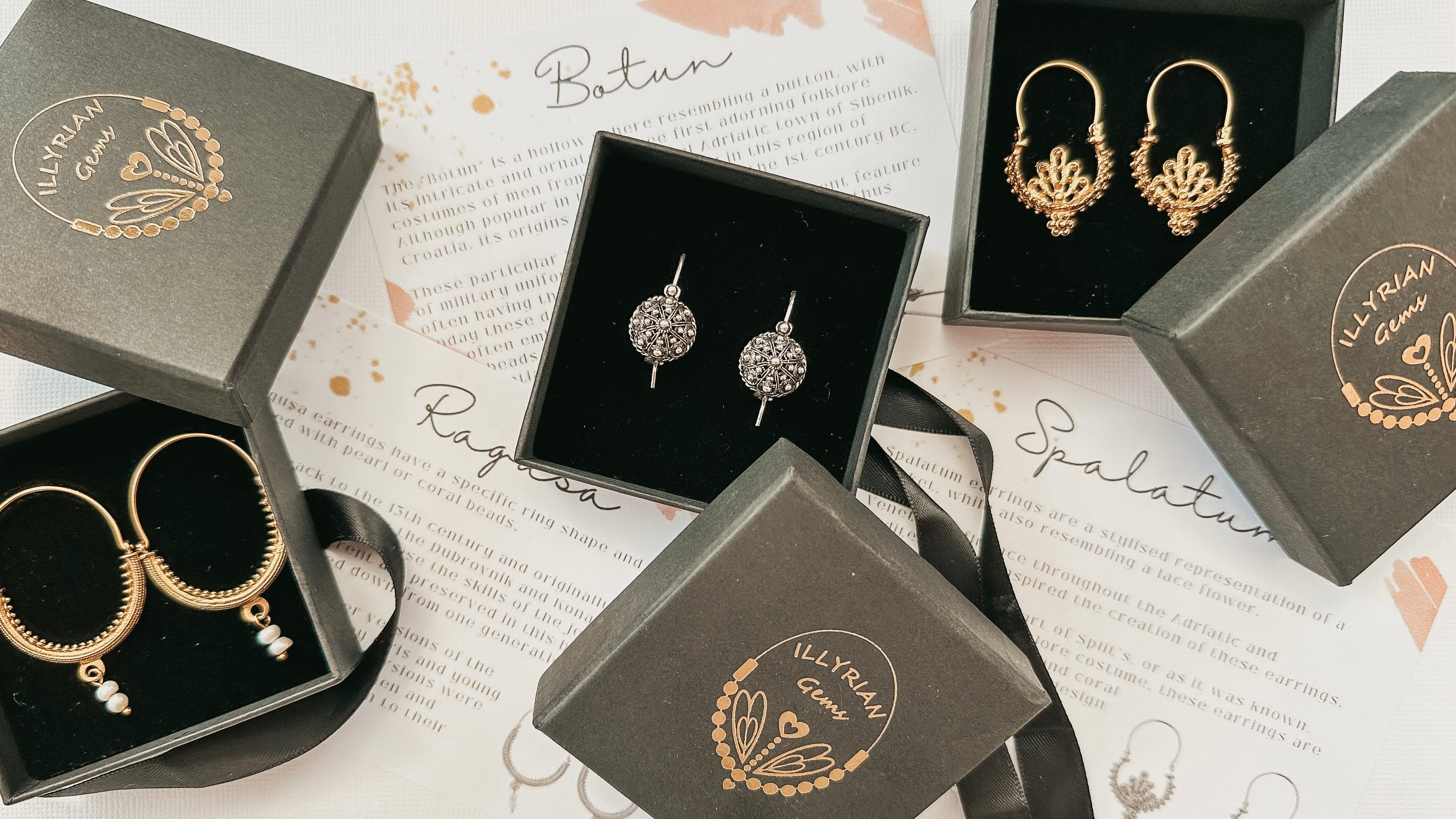 Earrings in Illyrian Gems boxes with notes about their history